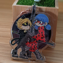 Load image into Gallery viewer, Chat Noir and Ladybug Acrylic Charm

